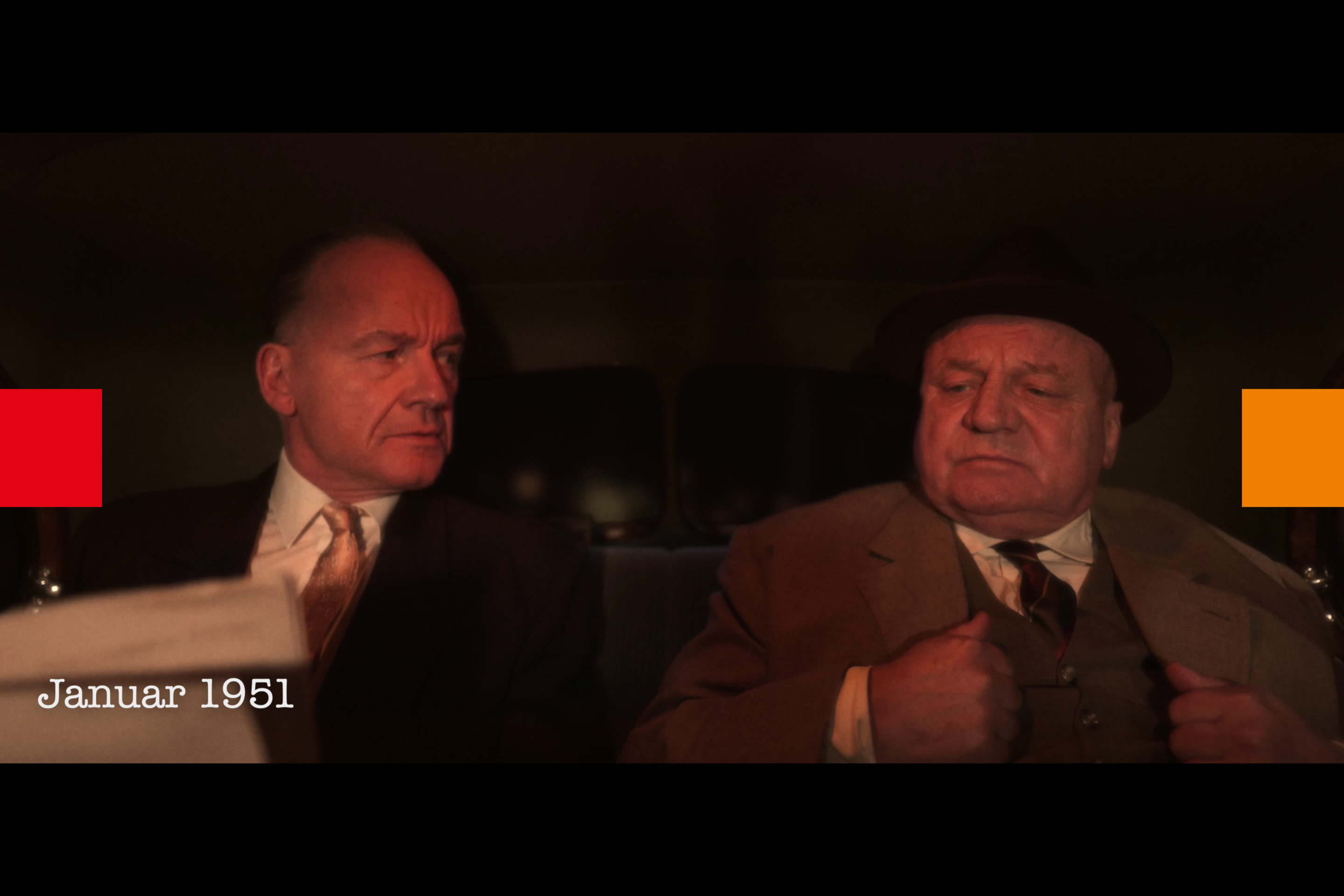 Konrad Adenauer und Hans Böckler sitzen im Auto.